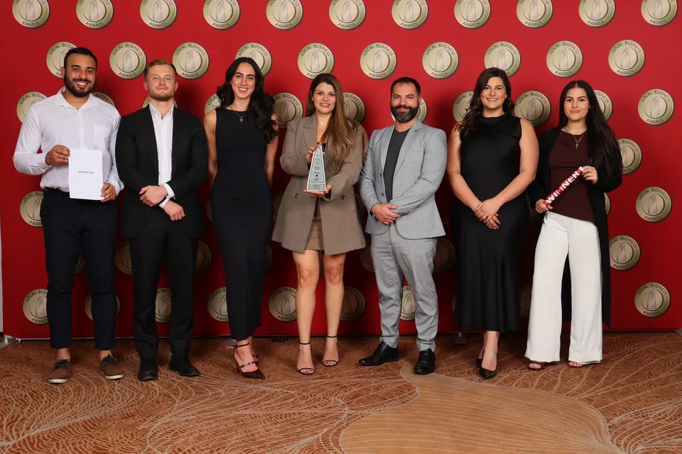 Members of the Jameson Law team at the 2026 Local Business Awards, holding the award.